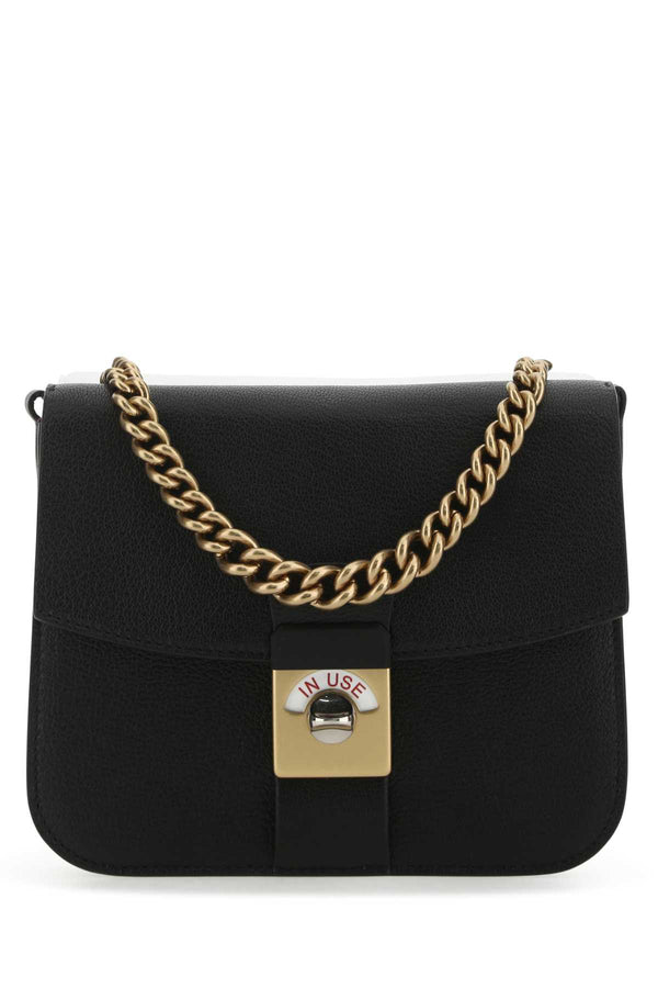 Maison Margiela Exterior: 100% Ovine leather; Lining: 100% Polyester; Finishing: Antiqued golden brass shoulder bag in black