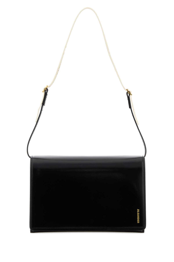 Jil Sander Exterior: 100% Calf shoulder bag in black