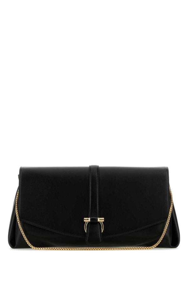 Ferragamo Nero Exterior: 100% Calf; Lining: 100% Fabric; Finishing: Golden metal clutch in black