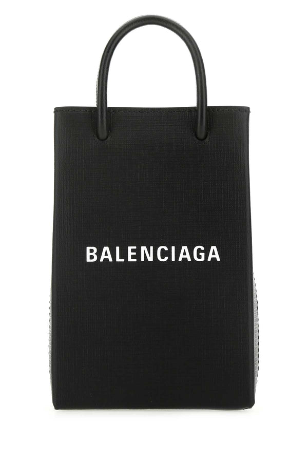 Balenciaga Exterior: 100% Calf; Lining: 100% Fabric; Finishing: Silver metal tote bag in black