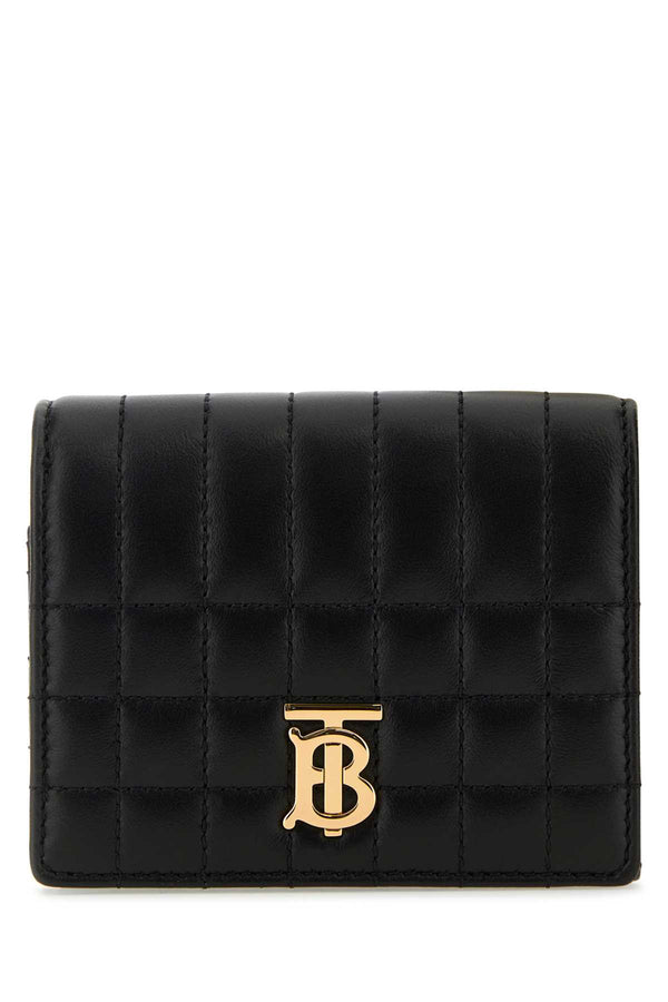 Burberry Exterior: 100% Lamb. Finishing: Golden metal wallet in black