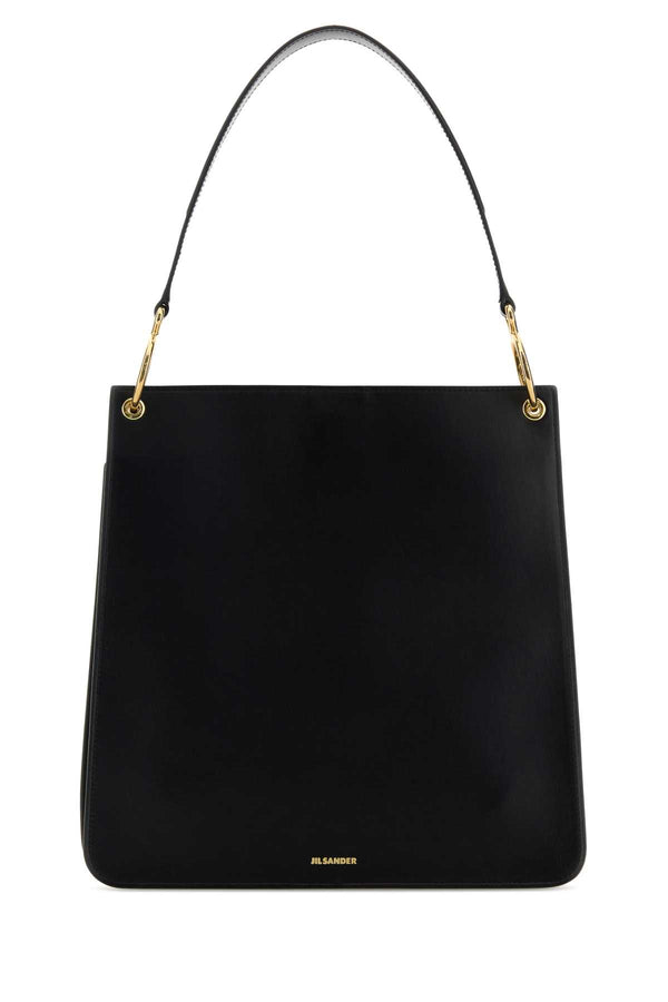 Jil Sander Exterior: 100% Calf shoulder bag in black