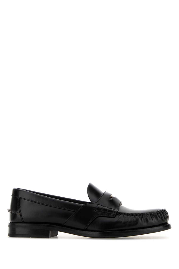 Prada Exterior: 100% Leather; Interior: 100% Leather; Sole: Rubber loafer in black