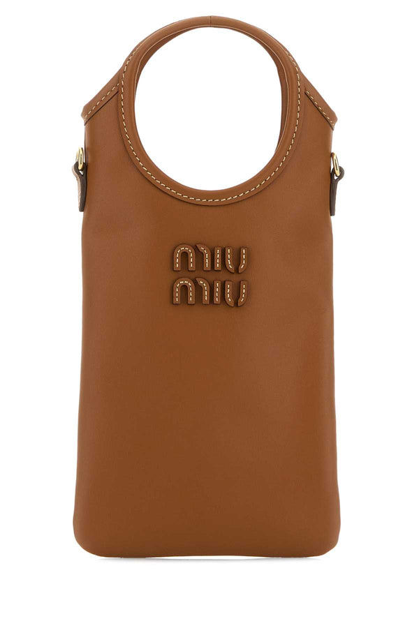 Miu Miu Exterior: 100% Leather; Finishing: Golden metal wallet in brown