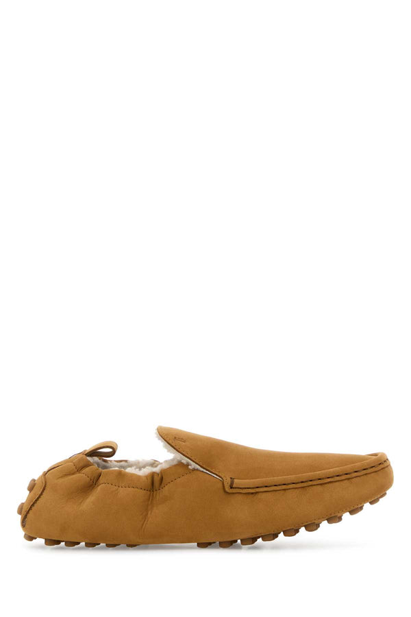 Tod's Exterior: 100% Suede; Interior: 100% Shearling; Sole: Rubber moccasin in camel