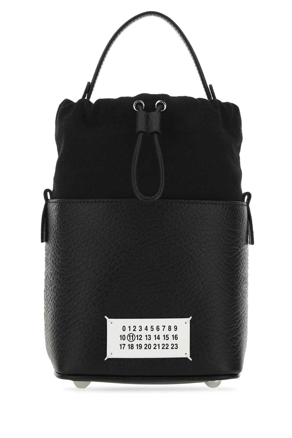 Maison Margiela Body: 100% Bovine Leather; Contrast: 79% Cotton bucket bag in black