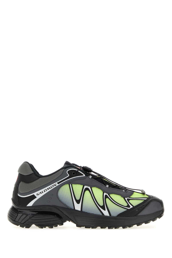 Salomon Exterior: 100% Fabric; Interior: 100% Fabric; Sole: Rubber sneaker in black