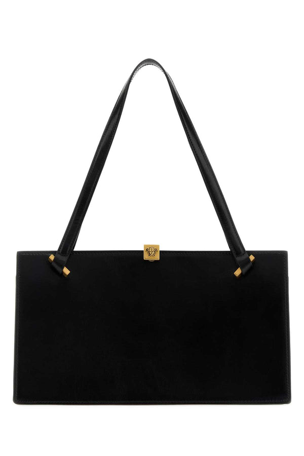 Versace Exterior: 100% Leather; Lining: 100% Leather; Finishing: Antiqued golden metal shoulder bag in black