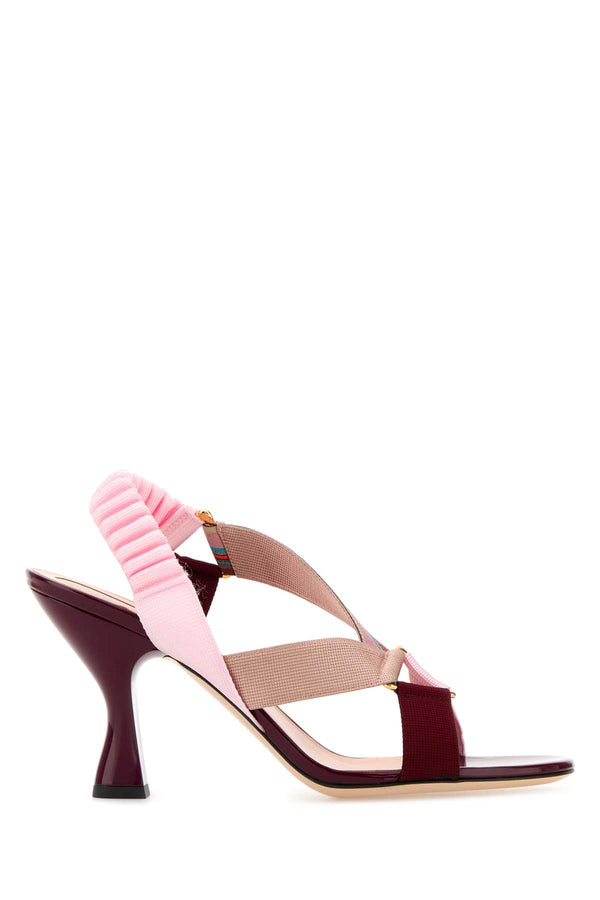Fendi Exterior: 100% Fabric; Interior: 100% Leather; Sole: Leather and rubber sandal in multicolor