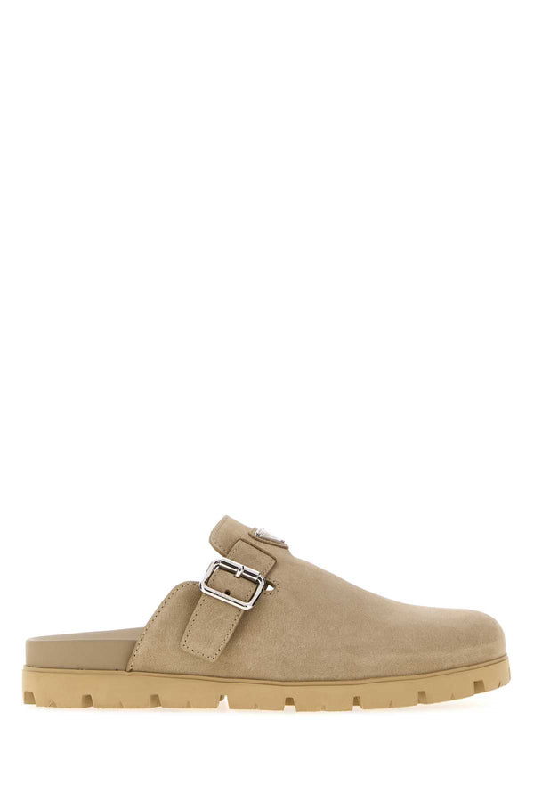 Prada Exterior: 100% Suede; Interior: 100% Leather; Sole: Rubber flat in beige