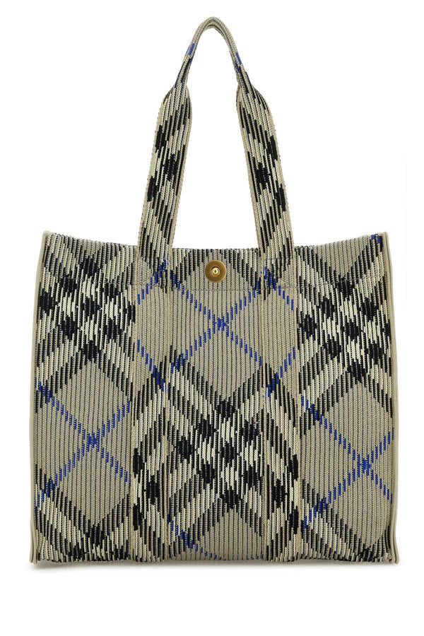 Burberry Knit Exterior: 100% Nylon; Finishing: Golden metal tote bag in beige