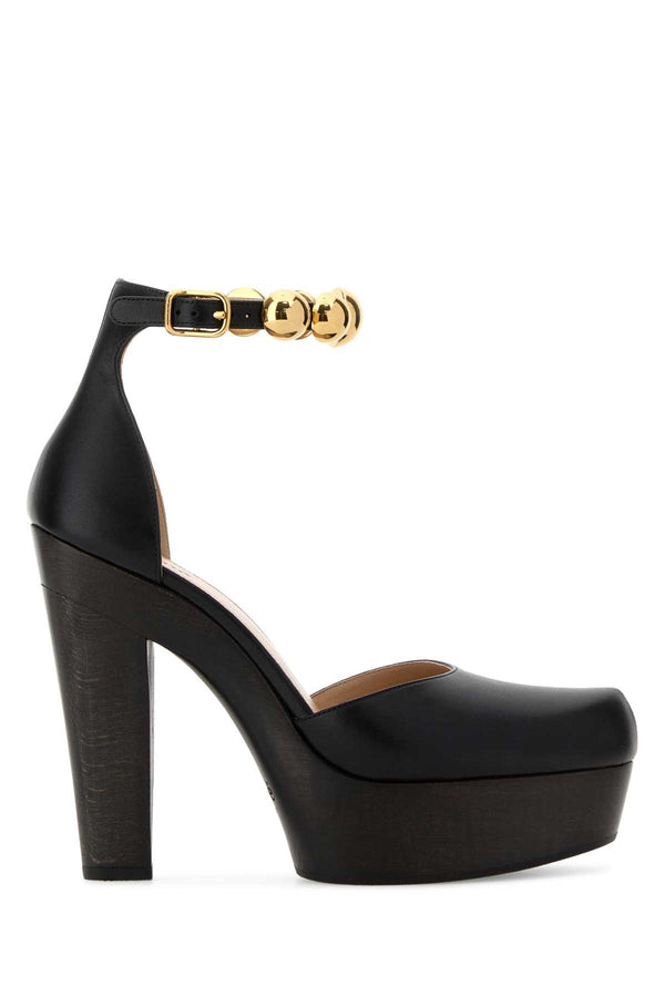 Chloé Upper: 100% calf leather; Lining: 100% domestic lamb leather; Heel: European beech wood; Sole: 100% thermoplastic polyurethane pump in black