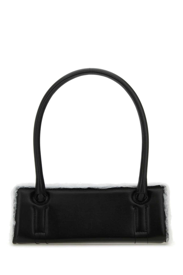 Dentro Exterior: 100% Leather shoulder bag in black