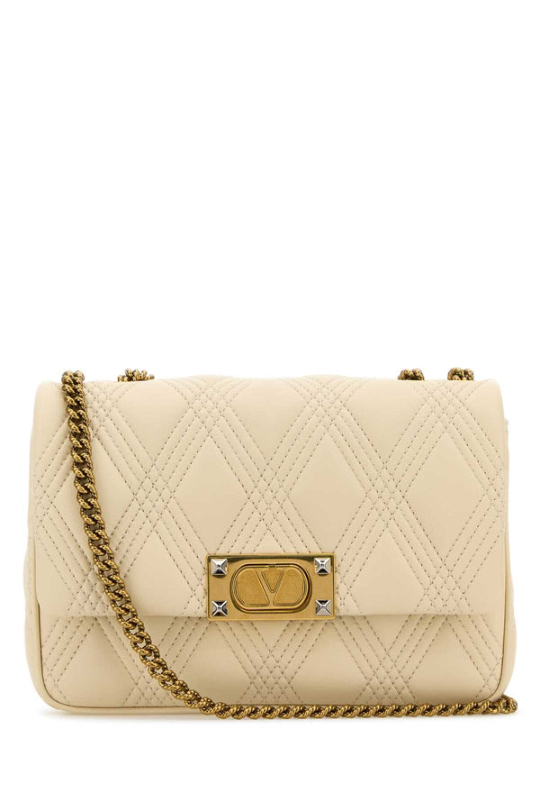 Valentino Garavani Shoulder Exterior: 100% Nappa leather; Lining: 100% Nappa leather; Finishing: Antiqued golden brass shoulder bag in beige