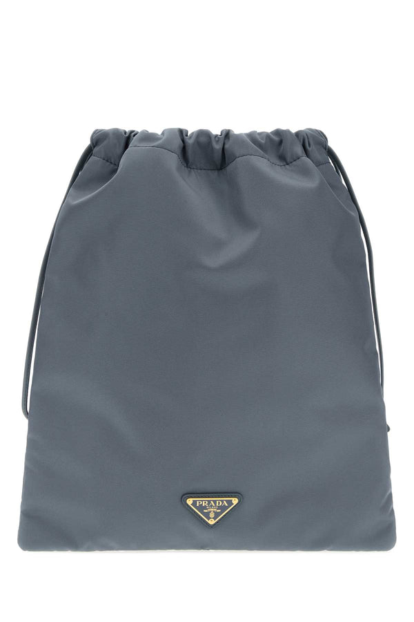 Prada Exterior: 100% Fabric Finishing: Golden metal bucket bag in powder blue