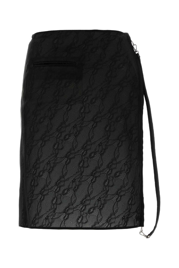 Courreges Exterior: 54% Nylon 35% Polyester 8% Polyurethane 3% Elastane; Lining: 100% Polyester skirt in black