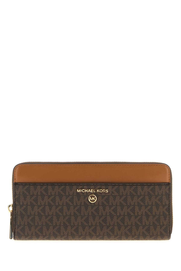 Michael By Michael Kors Exterior: 100% Fabric wallet in brown
