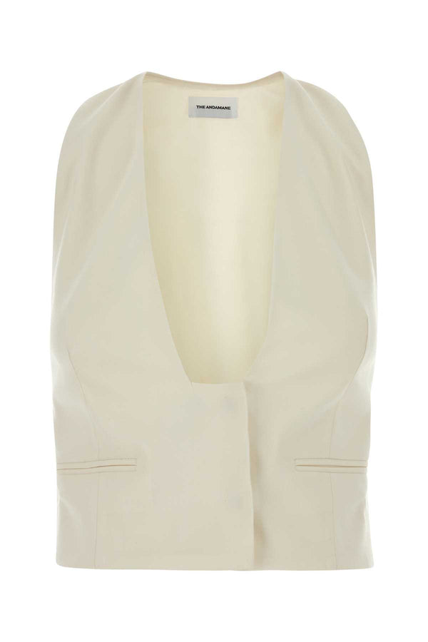 The Andamane Vest Exterior: 55% Polyester 45% Virgin wool 2% Elastane; Lining: 70% Acetate 30% Polyester vest in ivory