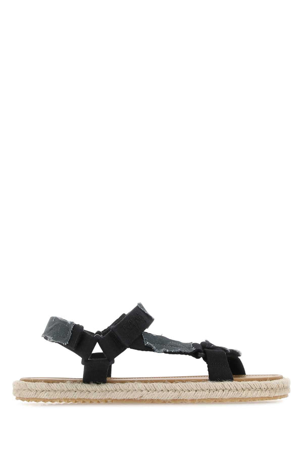 Maison Margiela Exterior: 100% Fabric Interior: 100% Leather Sole: Rubber sandals in black