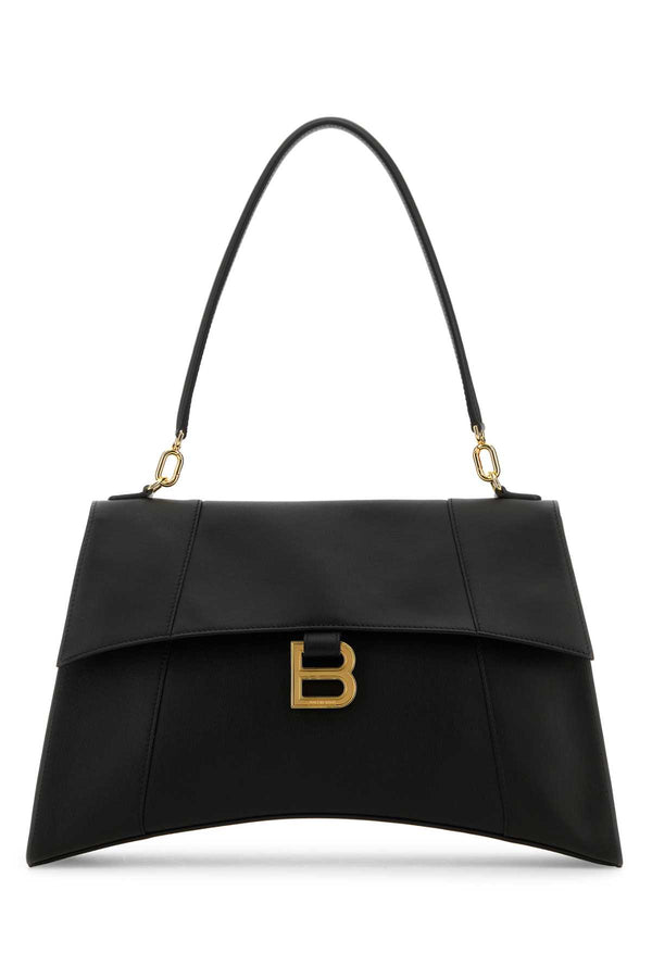 Balenciaga Exterior: 100% Calf. Lining: 100% Leather. Finishing: Golden metal shoulder bag in black