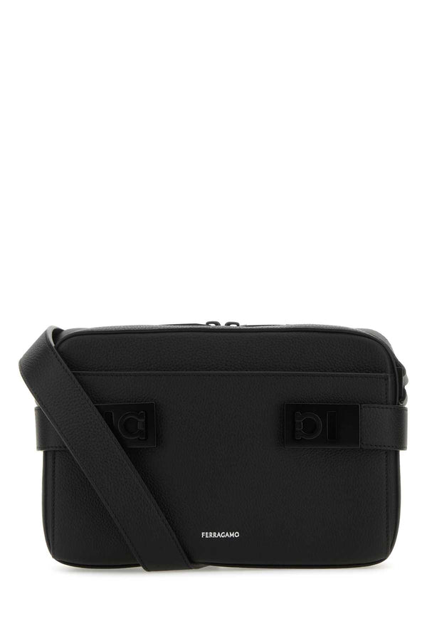 Ferragamo Nero Exterior: 100% Calf; Lining: 100% Fabric; Finishing: Silver metal crossbody bag in black