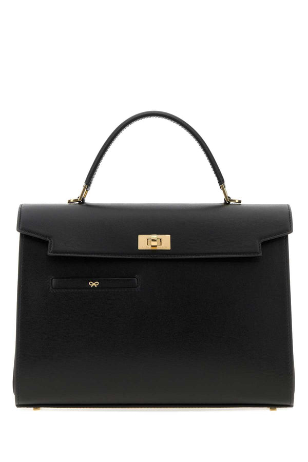 Anya Hindmarch Shiny Exterior: 100% Calf; Lining: 100% Leather; Finishing: Golden metal top handle bag in black