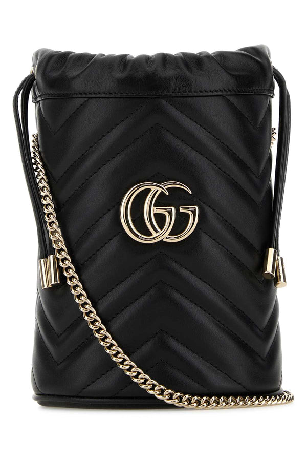 Gucci Marmont Exterior: 100% Leather; Lining: 100% Fabric bucket bag in black
