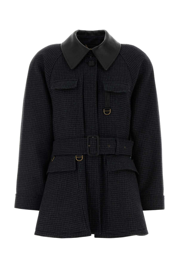 Chloé Exterior: 100% Virgin wool; Lining: 51% Viscose coat in black
