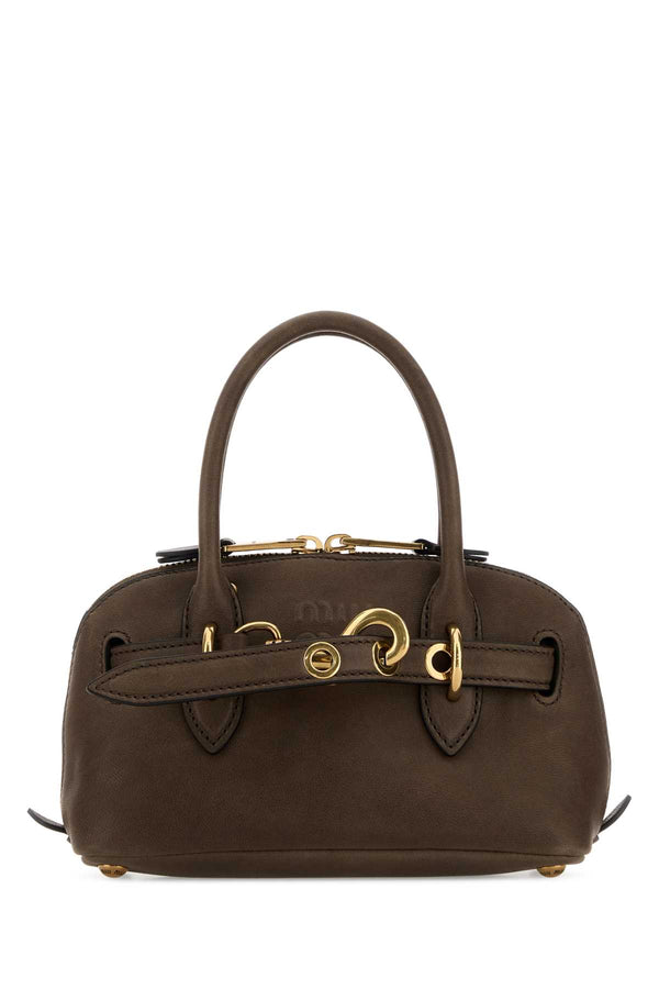 Miu Miu Exterior: 100% Leather; Lining: 100% Leather; Finishing: Antiqued golden metal top handle bag in brown