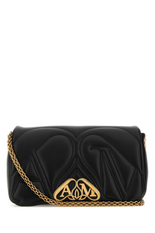 Alexander McQueen Exterior: 100% Lamb; Lining: 100% Leather; Finishing: Golden metal shoulder bag in black