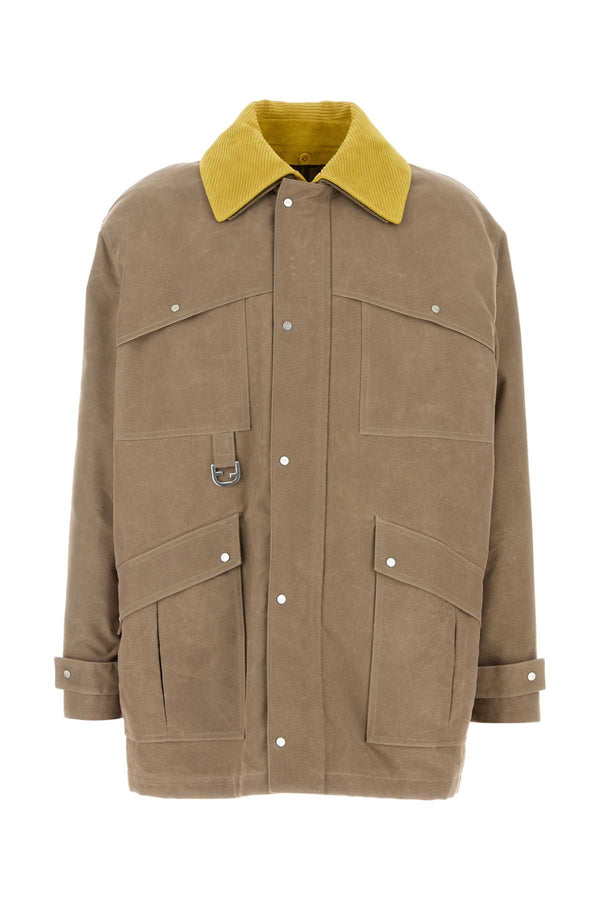Fendi Exterior: 51% Nylon 49% Cotton; Lining: 100% Nylon coat in beige