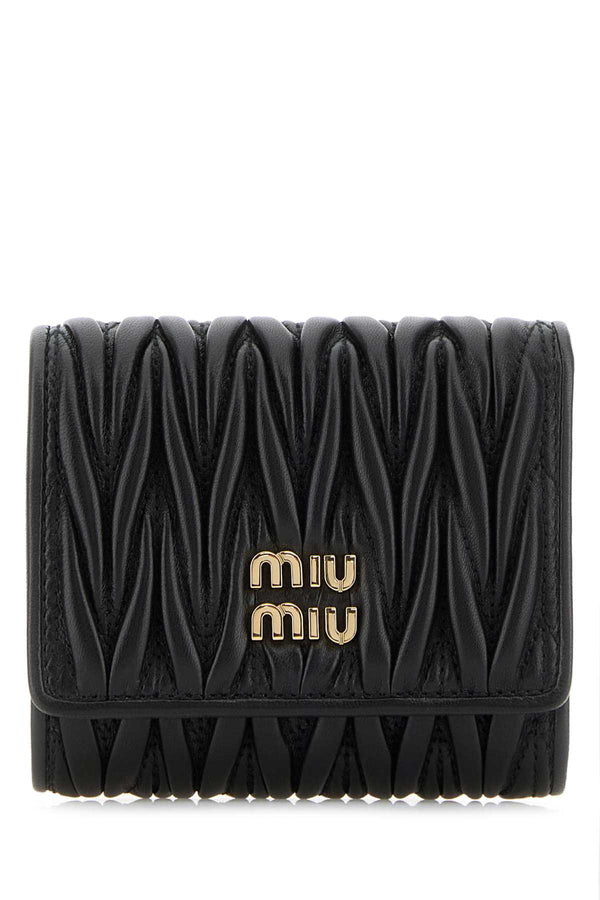 Miu Miu Exterior: 100% Leather; Finishing: Golden metal wallet in black