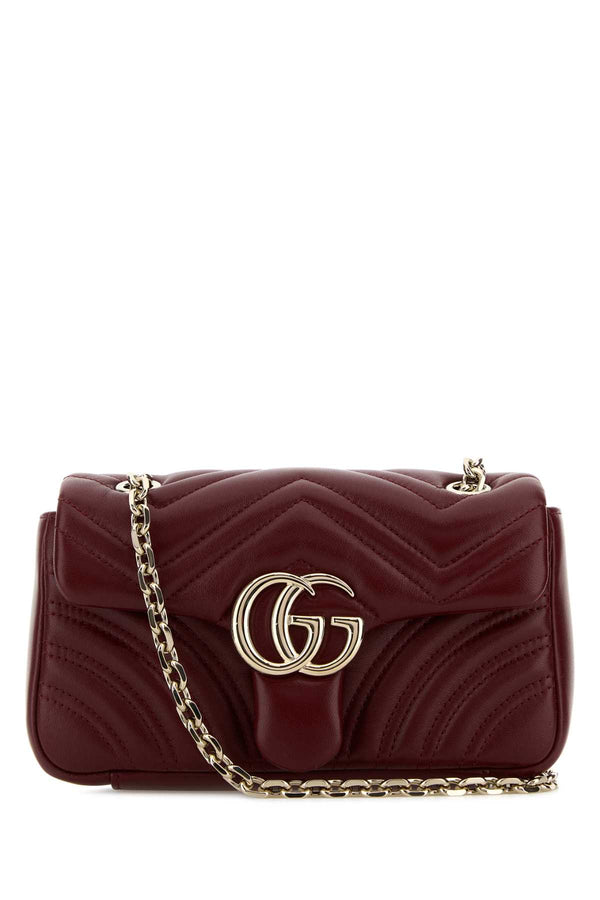 Gucci Exterior: 100% Nappa leather; Lining: 100% Fabric; Finishing: Platinum shoulder bag in red