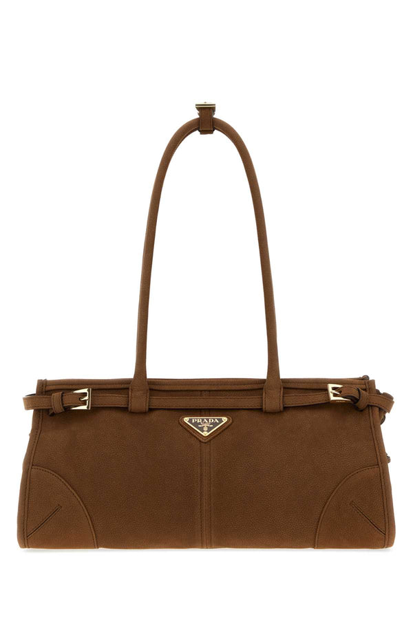 Prada Exterior: 100% Leather; Lining: 100% Fabric; Finishing: Golden metal shoulder bag in brown