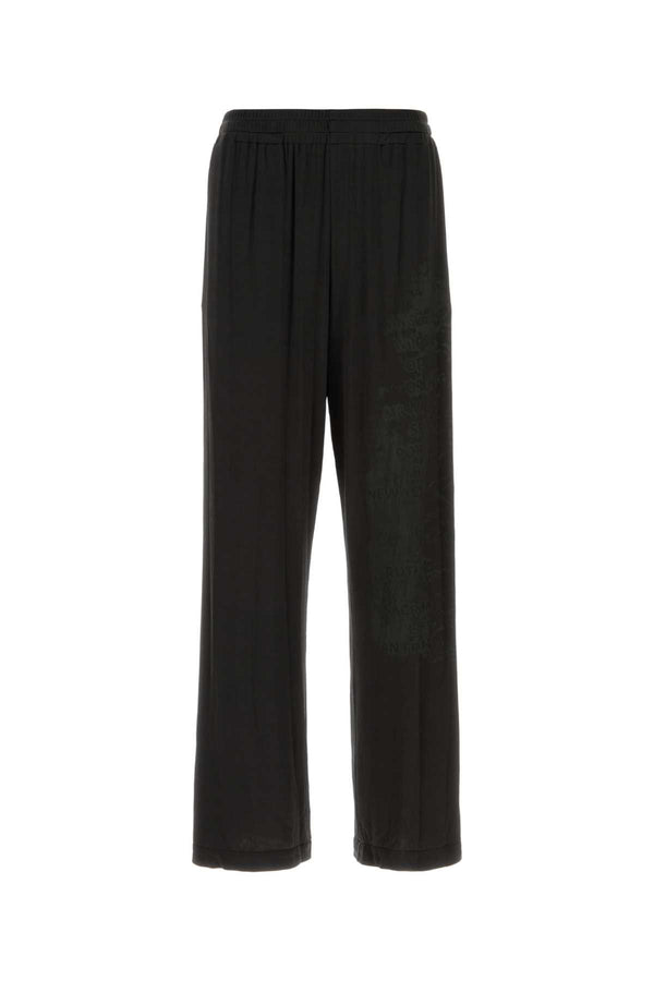 Diesel 94% Acetate trousers in black