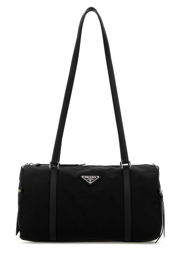 Prada Exterior: 100% Fabric; Lining: 100% Fabric; Finishing: Silver metal shoulder bag in black