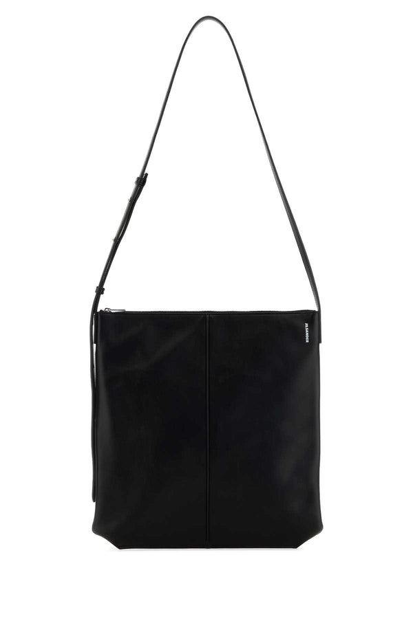 Jil Sander Exterior: 100% Calf leather; Lining: 100% Nappa leather; Finishing: Silver metal shoulder bag in black