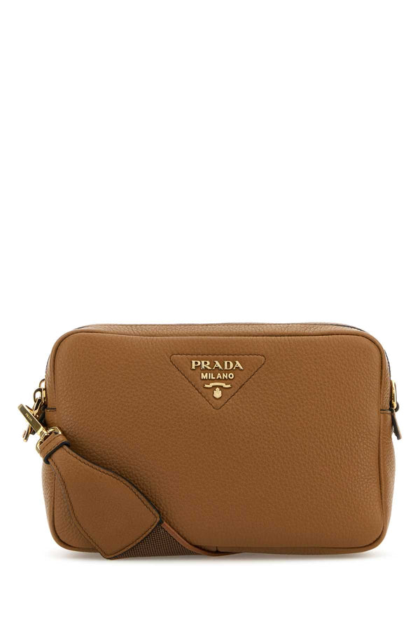 Prada Exterior: 100% Calfskin; Lining: 100% Fabric; Finishing: Golden Metal crossbody bag in brown