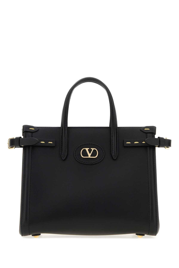 Valentino Garavani Exterior: 100% Leather top handle bag in black