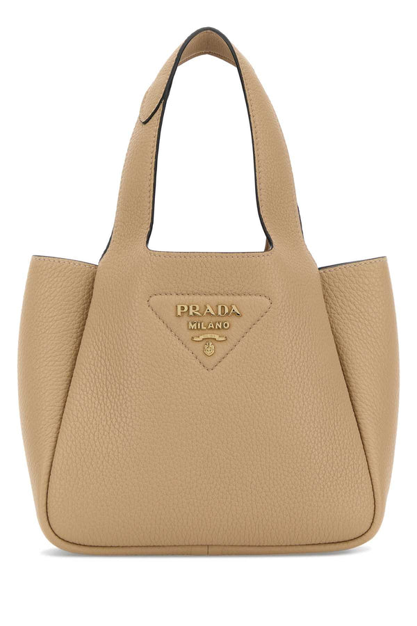 Prada Exterior: 100% Leather; Lining: 100% Leather; Finishing: Golden metal shoulder bag in beige