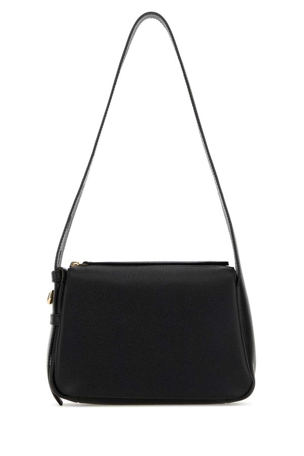 Tory Burch Shoulder Exterior: 100% Leather; Lining: 100% Fabric; Finishing: Golden metal shoulder bag in black