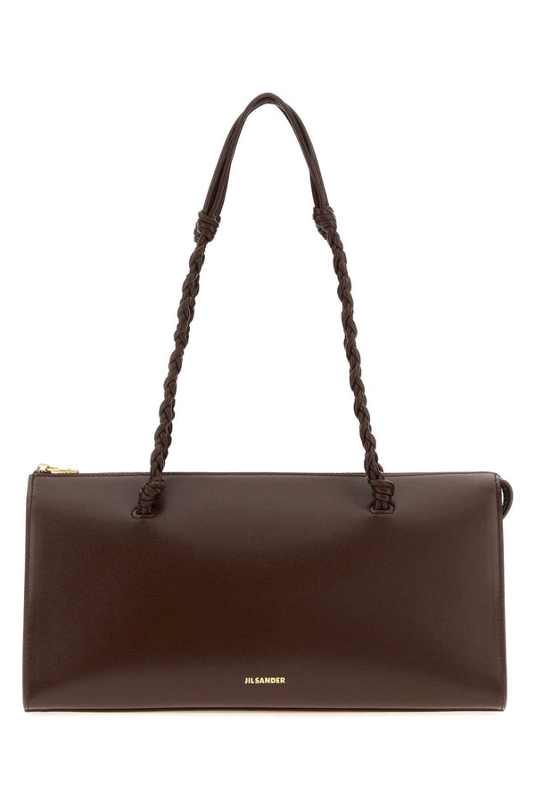 Jil Sander Exterior: 100% Calf; Finishing: Golden metal shoulder bag in brown