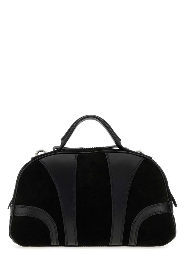 Dries Van Noten Exterior: 100% Suede top handle bag in black