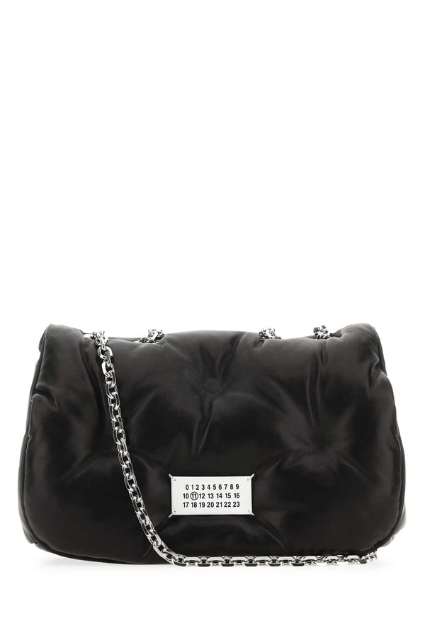 Maison Margiela Slam Body: 100% Sheep Nappa Leather; Appliqué: 100% Bovine Leather; Lining: 100% Polyester; Interior: 100% Sheep Nappa Leather; Hardware: 100% Brass and Zamak shoulder bag in black