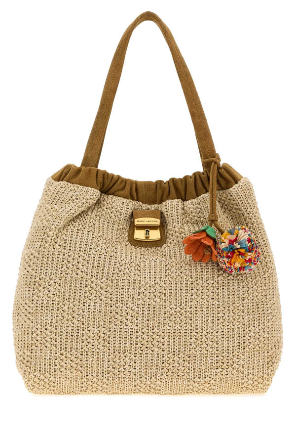 Marc Jacobs Tote Exterior: 100% Raffia; Lining: 100% Fabric; Finishing: Antiqued golden metal shoulder bag in beige