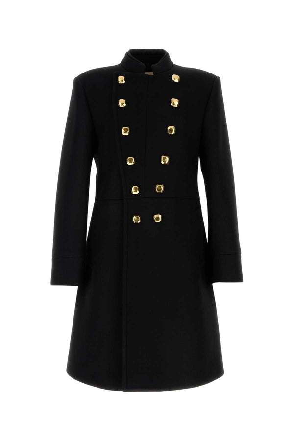 Valentino Garavani Exterior: 73% Virgin wool 27% Nylon; Lining: 100% Cupro coat in black