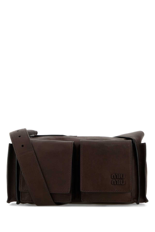 Miu Miu Exterior: 100% Nappa leather; Lining: 100% Fabric; Finishing: Silver metal crossbody bag in brown