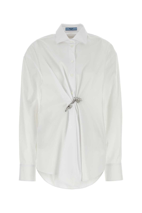 Prada 100% cotton with 60% crystal and 40% brass hardware; 100% trochus niloticus brooch shirt in white