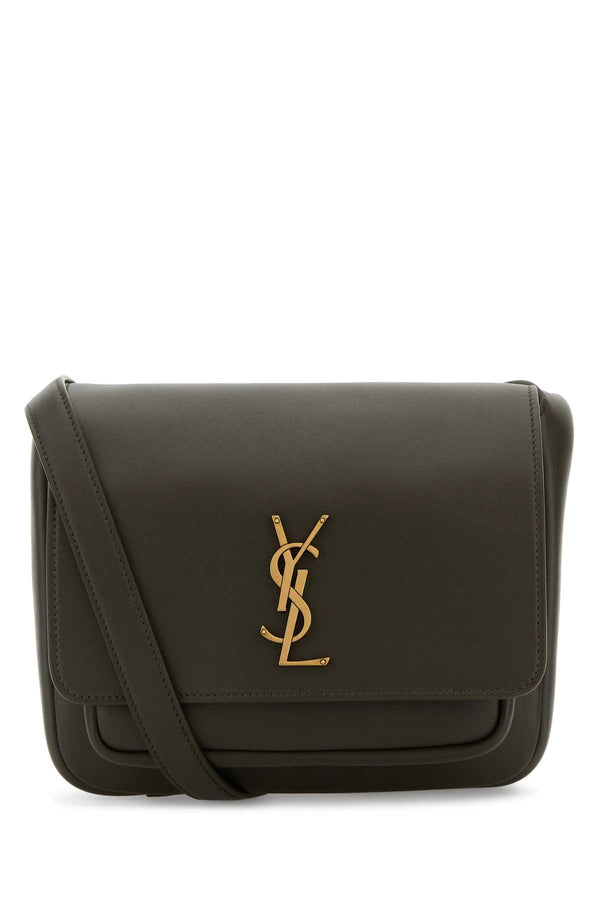 Saint Laurent Niki Exterior: 100% Calf Lining: 100% Suede Finishing: Antiqued golden metal crossbody bag in green