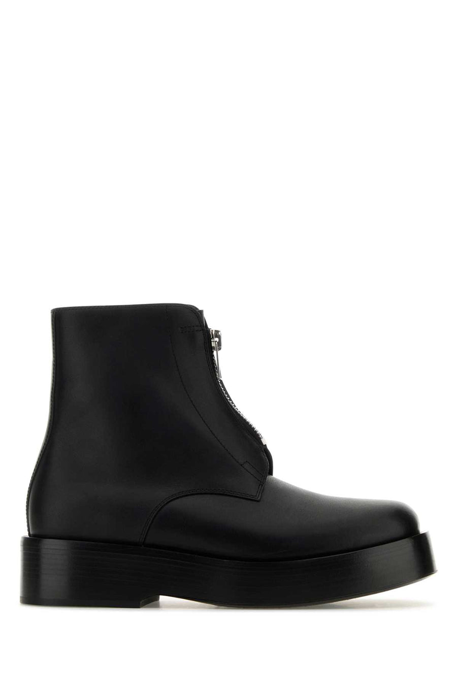 Bottega Veneta Leather Exterior: 100% Calf. Interior: 100% Leather. Sole: Leather and Rubber. ankle boot in black